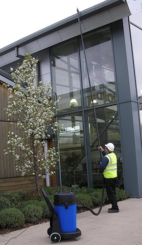 Vacuum cleaning gutters for commercial customers in Leatherhead